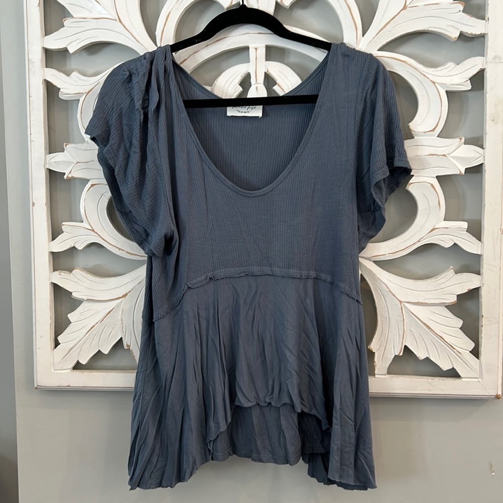 Lightweight peplum style top